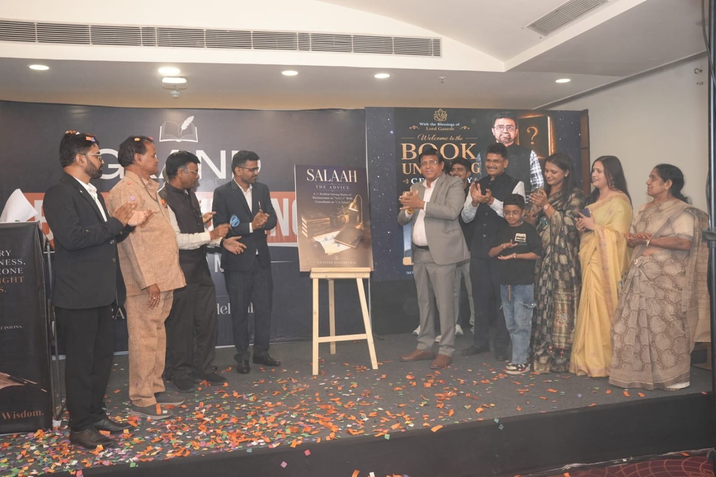 Book unveiling ceremony attended by the firm's clients and family